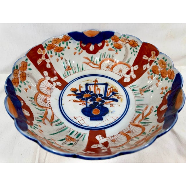 Vintage Scalloped Edge Imari Bowl Decorated With Vibrant Floral Motifs ...