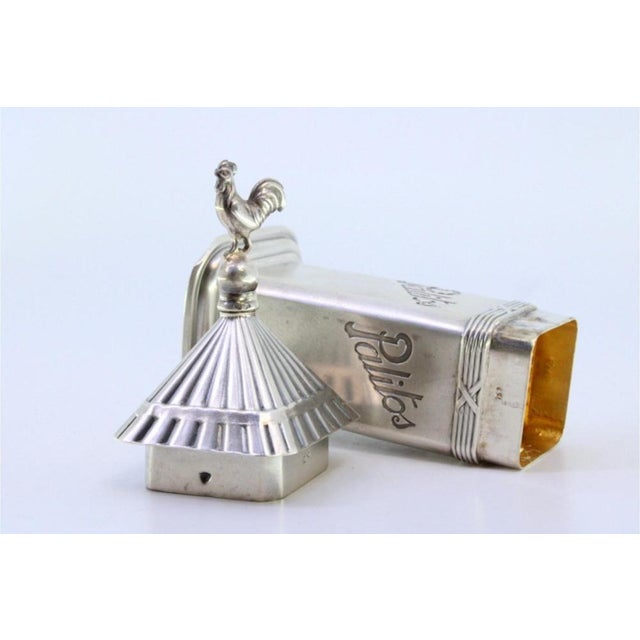 Silver Chicken Toothpick Holder with Rooster Top and Friezes, in Very Good conditions. Designed 1890 to 1919 This piece...