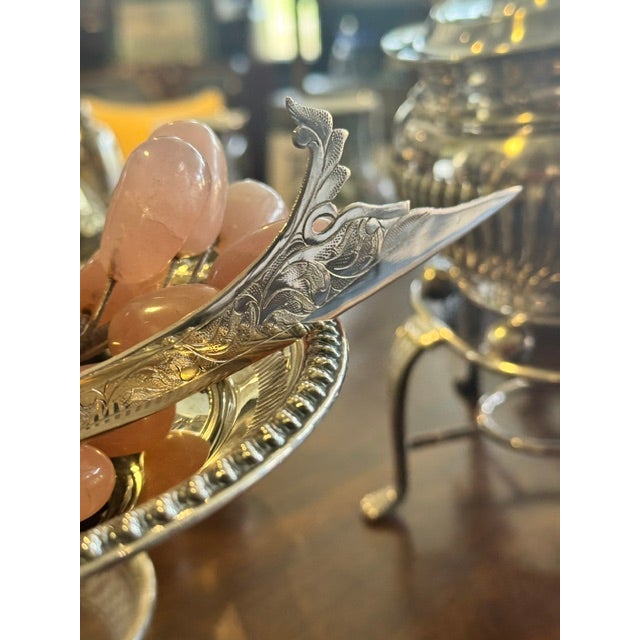 A striking and highly decorative letter opener inspired by the elegant form of the traditional Persian and Middle Eastern...