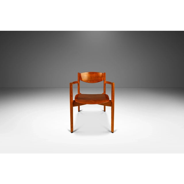Introducing an expansive set of eight stacking "General Purpose" arm chairs designed by Jens Risom for Jens Risom Design....