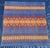 Add a touch of lodge-inspired warmth to your home with this vibrant vintage Southwestern camp and trade blanket. Featuring...
