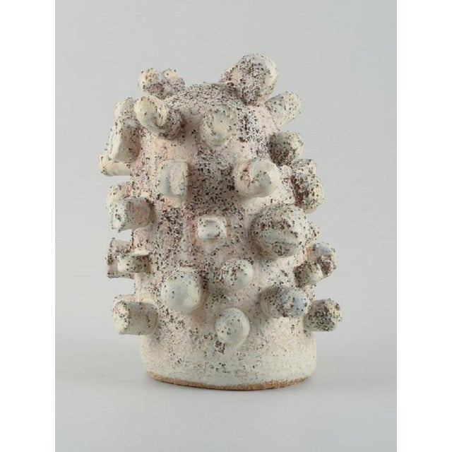 Christina muff, danish contemporary ceramicist (b. 1971). Large unique stoneware sculpture in off-white glaze with iron-...