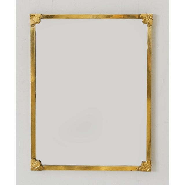 Mirror with brass frame with decor of shell shapes in corners. Made by FinnMirror Oy, Finland. Founded in 1923 by Kaarlo...