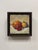Analagous Orange, Lime Juice, & Madrid Can Wring by Delton Demarest | Oil on board Still life of an orange, lime, and a decorative can. For Sale - Image 4 of 4