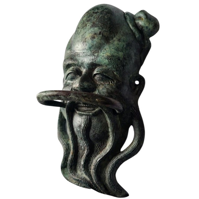 This vintage Asian Bronze Door Knocker is made of bronze with heavy patina. It is beautifully crafted, durable and ready...