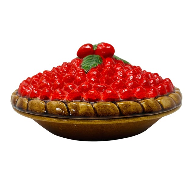 Introducing this stunning Vintage Portuguese Ceramic Strawberry Covered Pie Keeper, the perfect way to store and display...