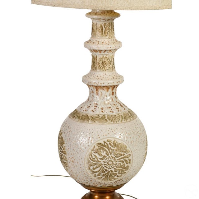 Tall iconic ceramic Mid-Century table lamp attributed to the Italian ceramic artist Marcello Fantoni. The lamp features...