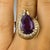 14k Ring with approximate 10.00 carat pear shape Amerthyst and 21 round brilliant diamonds weighing approximately 1.40...