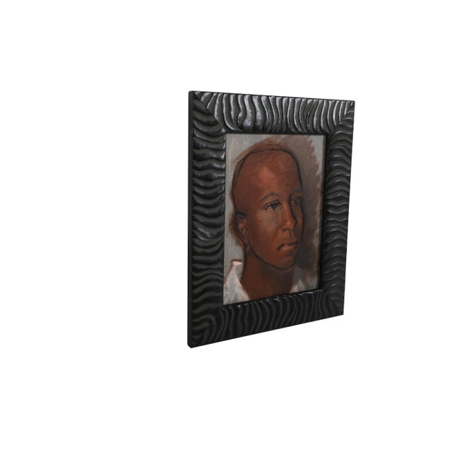 Original, one of a kind oil painting of a man on a canvas panel. Signed bottom right hand corner and framed in a wooden...