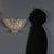 Gold Murano glass wall lamp in the shape of a shell. This piece is attributed to the mentioned designer/maker. It has no...