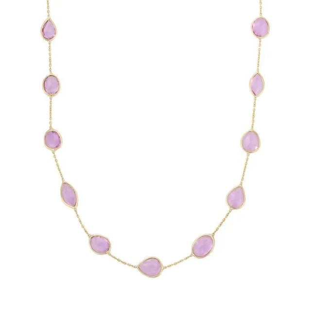 This is part of Chairish’s Fine Jewelry assortment. Pink Sapphire Necklace in 18K Gold studded with mix cut sapphire...