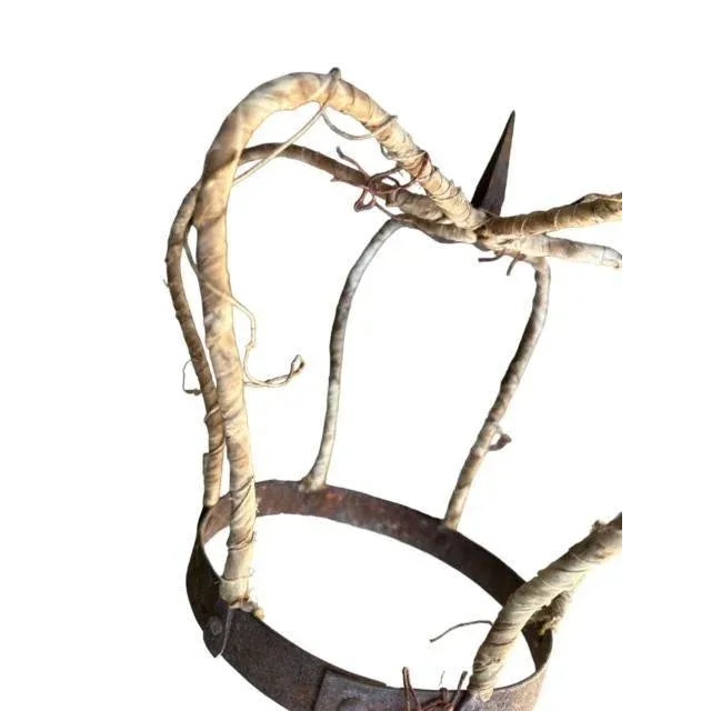 Madonna Crown: riveted iron covered in linen and string. Nice display piece.