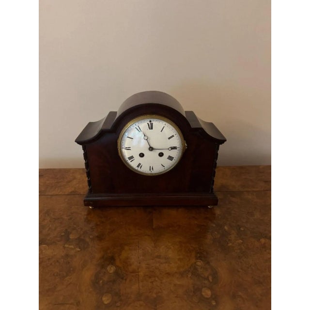Lovely quality antique Edwardian mahogany mantle clock, having a domed shaped case with ribbon carvings around the edges,...