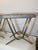 An elegant pair of original Italian stools from the 1950s, featuring a refined brass frame with an unusual sculptural...