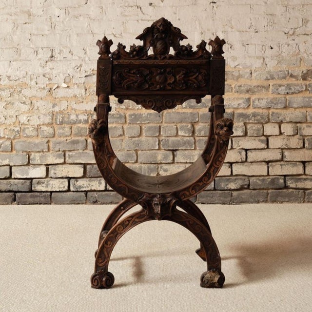 Add bold French character and sculptural detail to your space with this 19th century French wooden armchair, a striking...