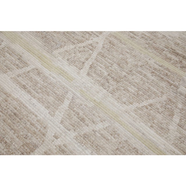 A stunning modern Turkish tulu rug that is sure to add a touch of warmth and luxury to any space. This rug has been...