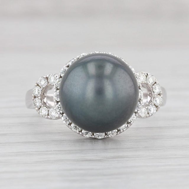 Gemstone Information: - Cultured Pearl - Size - 11.2 mm Cut - Round Shape Color - Black / Gray - Natural Diamonds - Total...