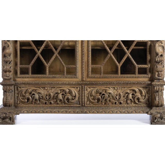 Large Display Cabinet Portuguese, 19th-century Baroque style, In carved chestnut wood decorated with vegetal elements,...