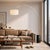 A SILVER ARC THAT LIGHTS YOUR SOFA FROM ABOVE. NO CEILING WIRING NEEDED. This modern arc floor lamp sweeps 79" across your...