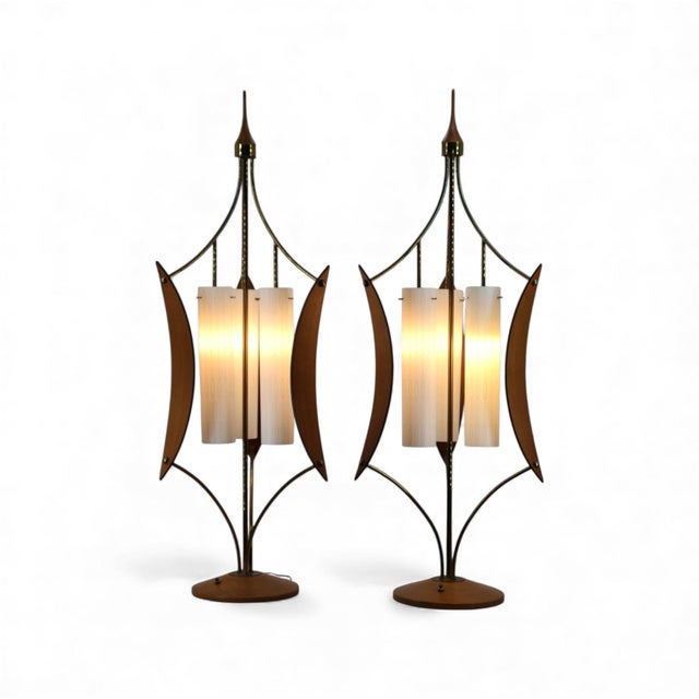 These sculptural vintage floor lamps date to the 1960s and embody the dramatic, architectural side of mid century modern...