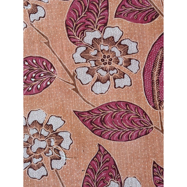 SPECIFICATIONS A loose, leafy floral inspired by a vintage batik, Kava Cay Indoor/Outdoor in mango is a beautifully...
