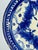 Large 19th-century blue and white faience plate from Manises, Spain. Hand-painted in cobalt blue on a warm cream ground,...