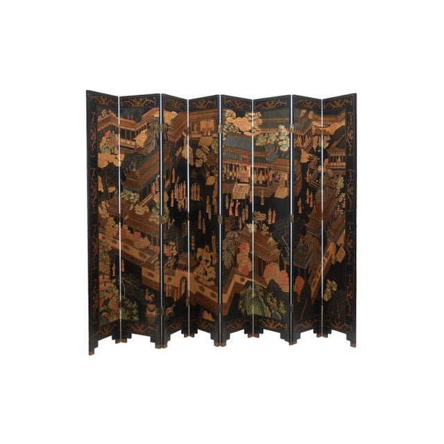This 20th-century Chinese eight-panel lacquer screen is a true statement piece, blending artistry, craftsmanship, and...