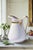 CHARLES FIELD HAVILAND GILDED PORCELAIN CREAMER Era: 1865-1875 Origin: Limoges, France Material: Fine White Porcelain with...