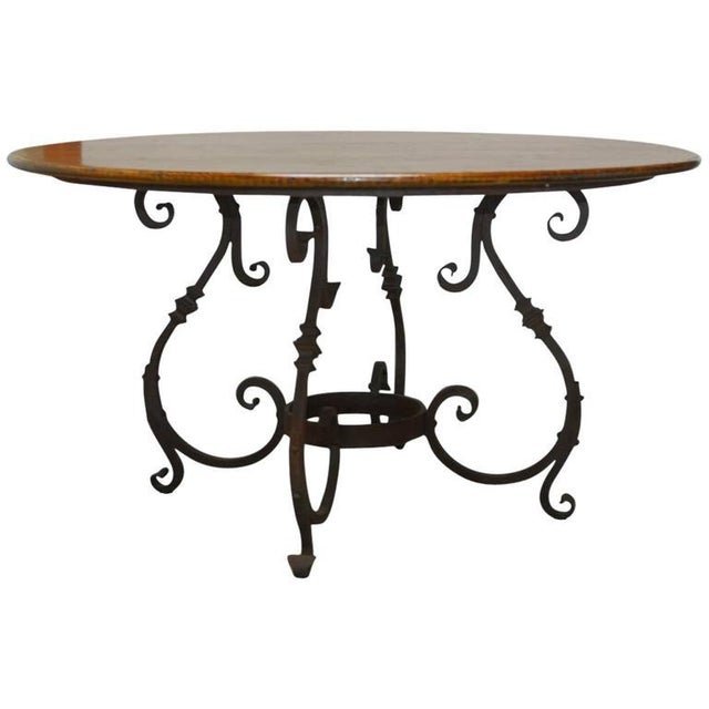 Italian Oak & Scrolled Iron Round Dining Table | Chairish