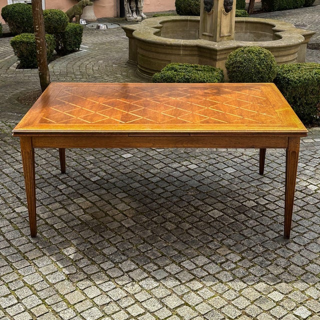 Early 20th Century Extendable Dining Table with Parquet Top, in Very Good conditions. Designed 1890 to 1919