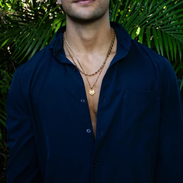 Unleash your inner strength with the Golden Wolf Spirit Men’s Necklace, crafted from 925 sterling silver and plated with...