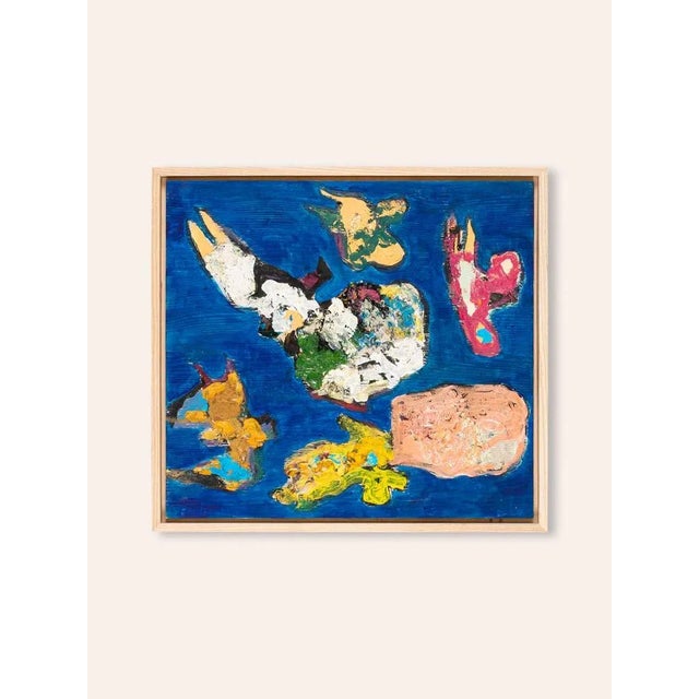 Abstraction of flying objects against cobalt blue. Oil on board framed in a shadow gap frame of ash ready to hang. Image...