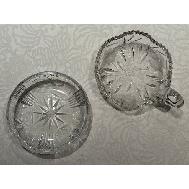 These two bowls/dishes date back to ABP in the late 19th century. One of them is handed. They are both intricately...