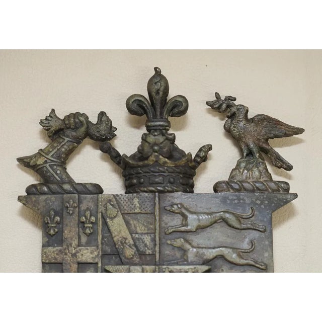 We are delighted to offer for sale this lovely antique solid bronze coat of arms armorial crest with lovely natural...