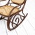 Roking chair THONET stamp present on the wood, caning in good condition. This piece has an attribution mark, I am sure...