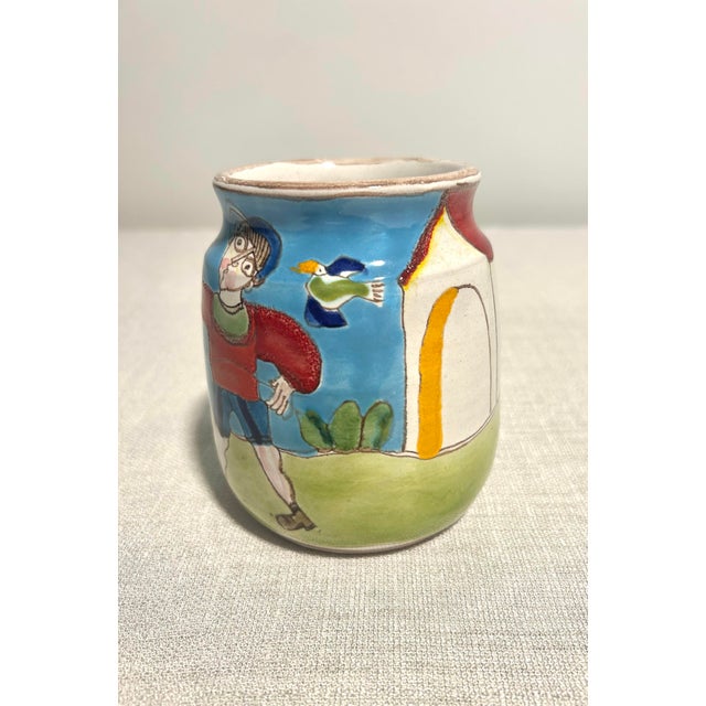 Vibrant and richly detailed, this MCM Italian DeSimone for Vietri hand-painted cachepot combines the bold artistic flair...