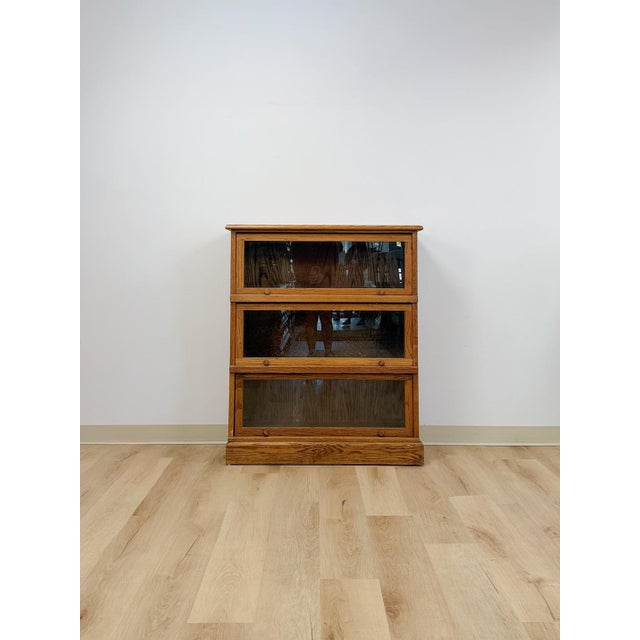This antique oak barrister bookcase brings the classic lawyer's-library look into any home library, study, or office....