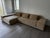 This is an as-new Restoration Hardware deep modular sectional, upholstered in a performance sand-beige velvet that reads...