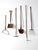 A charming collection of six early 20th century garden tools featuring weathered wood handles and aged iron heads. The...