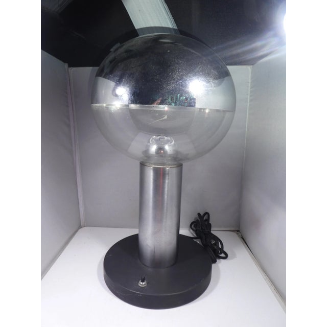 Space Age Chromed Glass Ball Table Lamp sold as found rewired showing some ight wear to finish at the base. Lamp is in...
