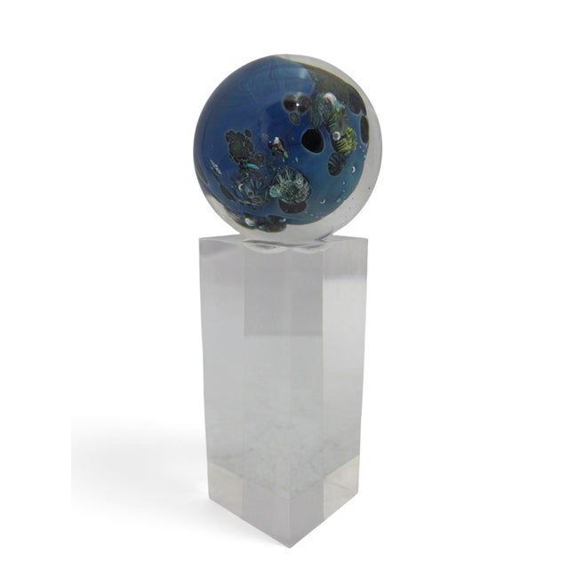 Josh Simpson art glass marble or paperweight from the Inhabited Planet collection. Simpson's Inhabited Planets are...