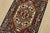 A traditional tribal Heriz rug hand-knotted with fine wool on a cotton foundation. This oriental rug features a central...