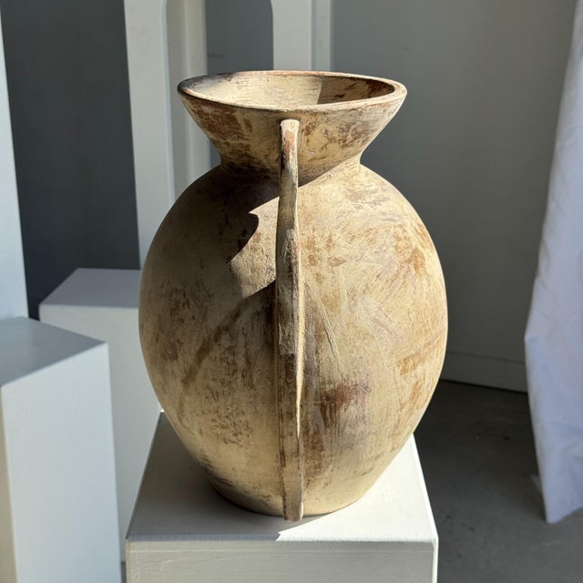 Large cream-colored terracotta vase with double spiral handles in an antique style. Weight: 5.2 kg; Height: 42 cm; Maximum...