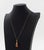 14K Rose Gold Baltic Amber Pendant Necklace, featuring one non-detachable amber pendant approx. 12.50 carats, worn on fine...