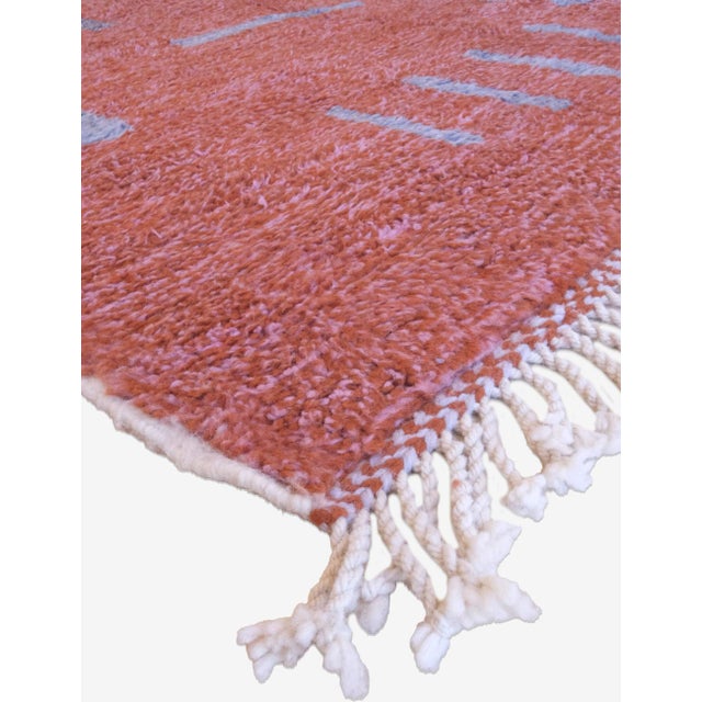 This 10 x 6.6 ft orange moroccan rug adds a vibrant touch to any room. Enjoy the soft, durable material and intricate...