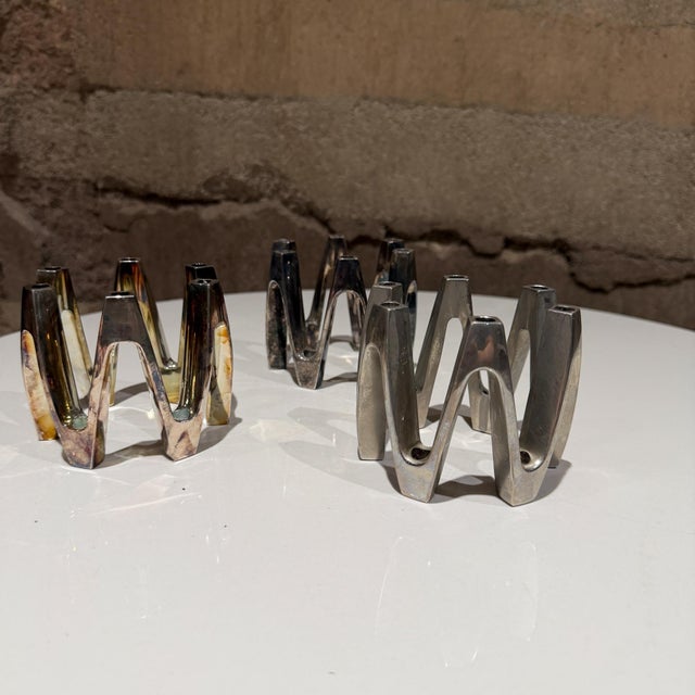 For your consideration, a set of three (3) silver-plated candle holder is a vintage "Crown" model designed by Jens...