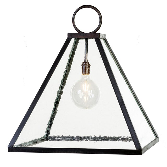 McCormick Pendant with Seeded Glass on an impressive pyramid frame can be used with or without glass.This light fixture...