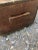 Charming distressed small wooden trunk having wooden handles and wonderful patina.
