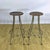 This pair of fixed stools faithfully reflects the industrial style of the 1960s, a period characterized by the fusion of...
