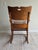 This is a wonderfully unique antique rocking chair. It has lovely details including carved spindles. Even the seat is...